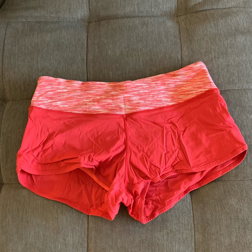 Red lululemon shorts.
